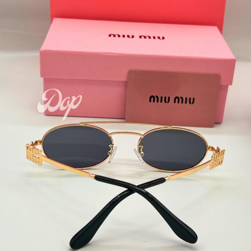 نظارة ميو ميو بإطار ذهبي بيضاوي