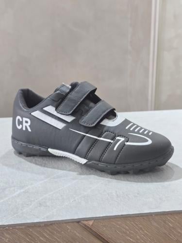 حذاء كرة قدم رصاصي شبابي