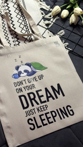 حقيبة قماشية - لا تتخلى عن حلمك واصل النوم -