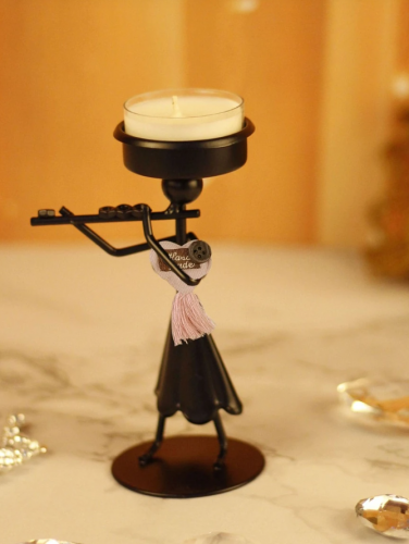 حامل شمعة بتصميم شخصية حديد قطعه واحده