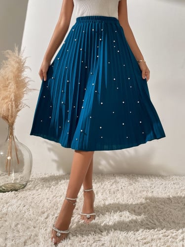 تنوره مزينه بالؤلؤ بثنيات وخصر عالي