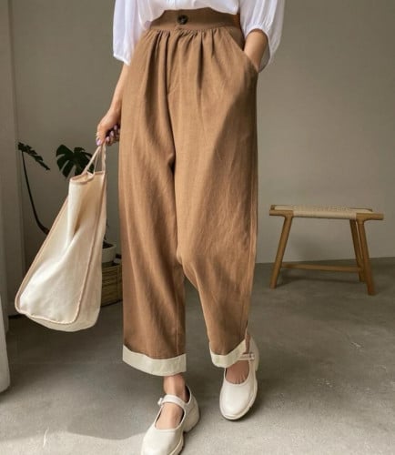 بنطلون بجيب مائل و حافة ملتف