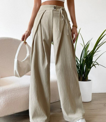 بنطلون بساق واسع خصر الي تفاصيل خياطة