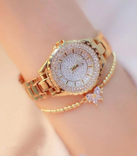 ساعة كوارتز بقرص مؤشر دائري بديكور حجر الراين مع اسوارة