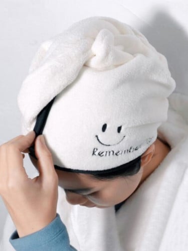 منشفة الشعر مطرزه بوجه مبتسم