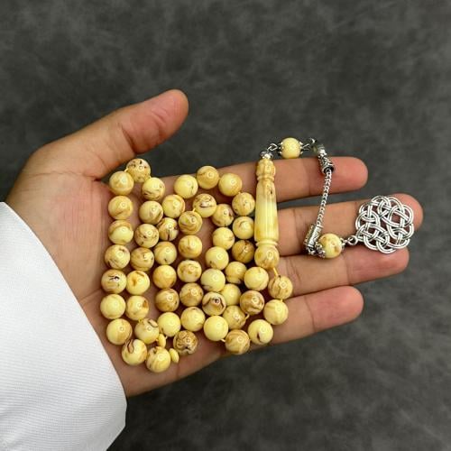 سبحه بكلايت لون بيج مموج مع كركوشة