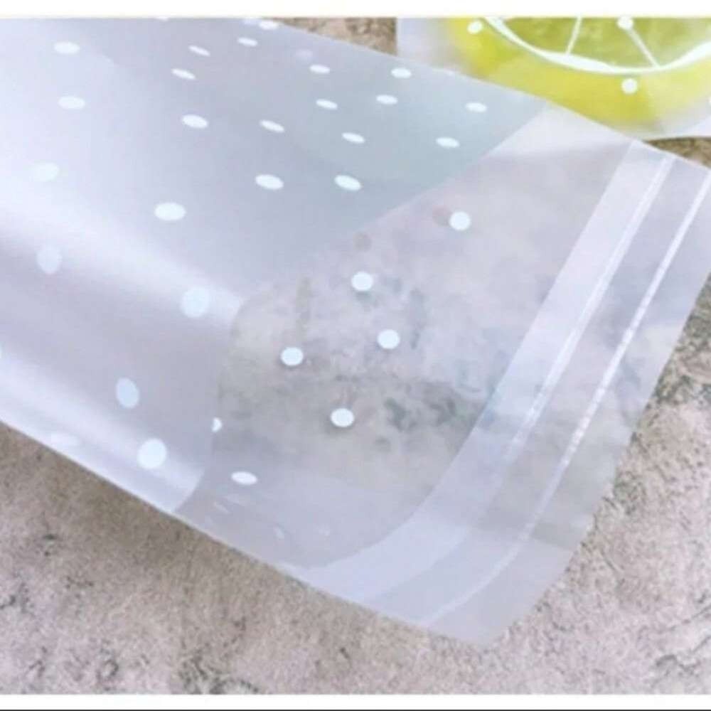 مجموعة | 1000 كيس كوكيز شفاف منقط 14*14