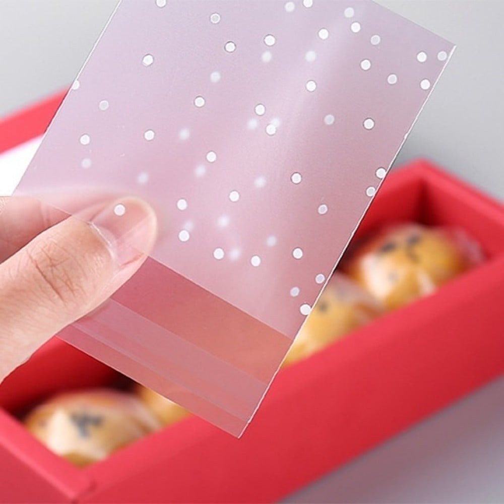 مجموعة | 1000 كيس كوكيز شفاف منقط 14*14