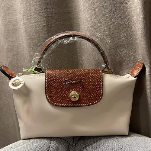 Longchamp XS - بيج مع ستراب