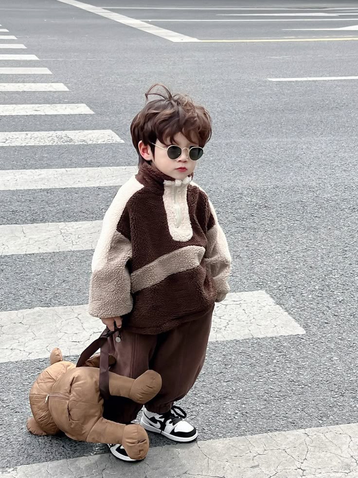 ملابس اولاد صغار