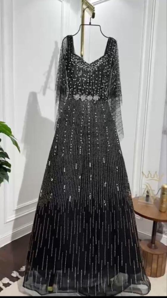 فساتين سهره     كريب استرتش.. فصوص كبس