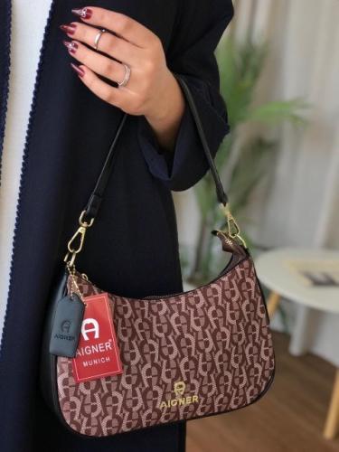 شنطة يد نسائية AIGNER - هايكواليتي بتصميم أنيق