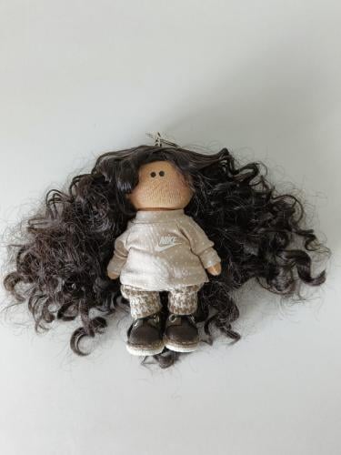 دمية ميدالية او تعليقة سيارة.