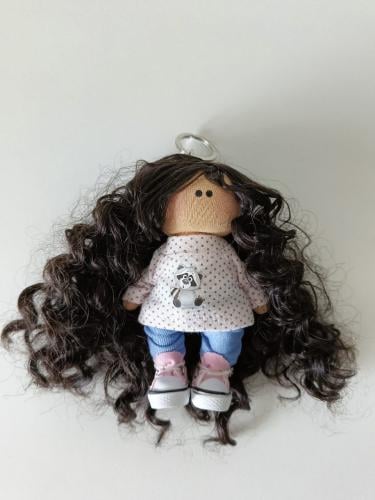 دمية تعليقة سيارة او ميدالية.