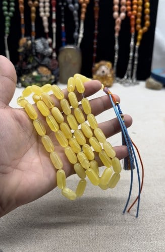 كهرمان بولندي بياض قص صنوبري ٤٠ جرام ٨ مل ٤٥ خرزه