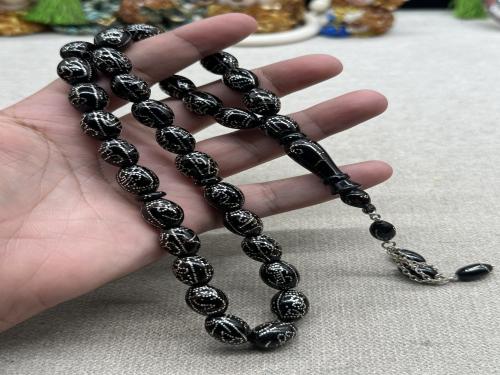 يسر بلدي بحر احمر مطعم فضه بالكامل ( اسماء الله الحسنى على كل الخرز والشاهد) ٣٣ خرزه ١١ مل