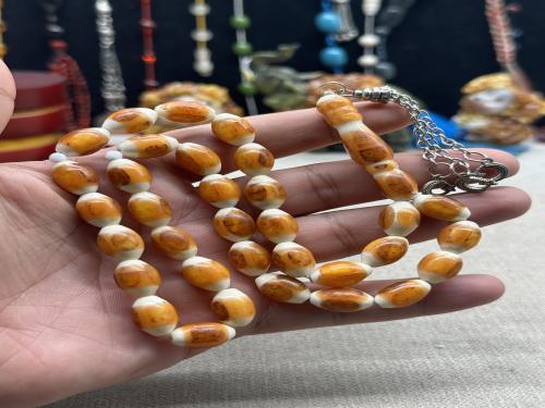 مسباح عضم ملبس كهرمان بالكامل ٩ مل ٣٣ خرزه