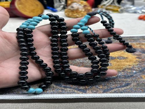 عقيق اسود فواصل فيروز عدادين ٩٩ خرزه ٨ مل