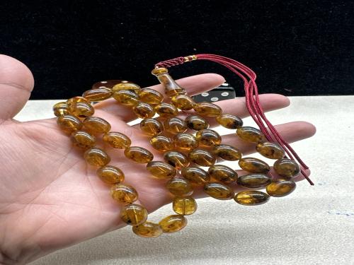 كهرمان بلطيقي شوائب ١٠ مل ٤٥ خرزه ٤٠ جرام