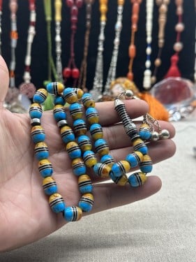 يسر  ملبس فضه وفيروز وكهرمان ٨ مل ٣٣ خرزه