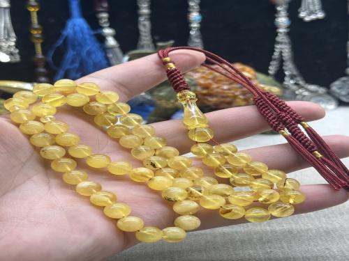 كهرمان كلنغرادي لون وخامه ولا اروع ٨ مل ٦٦ خرزه ١٨ جرام