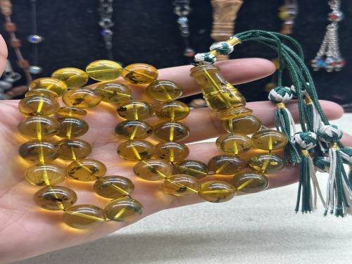 اندر الكهرمان ( حشري فل حشرات بالكامل بلطيقي ) ٣٣ خرزه ٤٩ جرام ١٣ مل