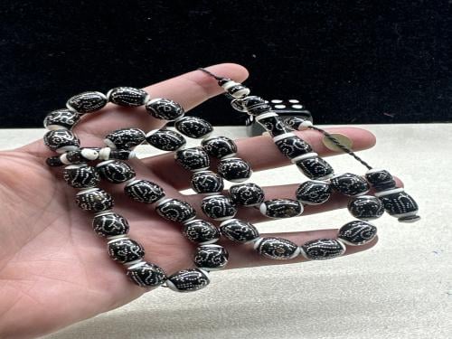 يسر ملبس طرابيش عاج ومطعم فضه اسماء الله الحسنى ١٠ مل ٣٣ خرزه