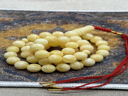 كهرمان مشخط تايقر افخم انواع الكهرمان ( ٥٩ جرام ٦٠ خرزه 11 ونص مل)