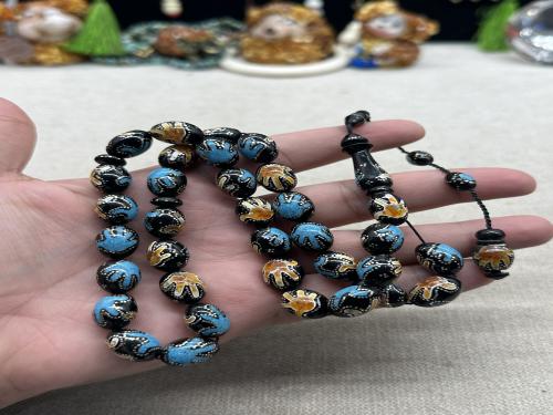 يسر بلدي بحر احمر مطعم فيروز طبيعي وكهرمان وفضه على شكل كف ١١ مل ٣٣ خرزه