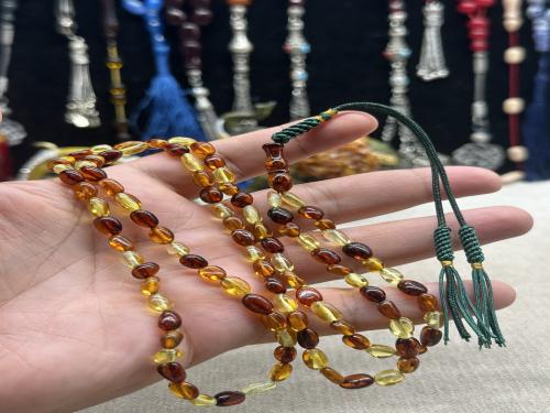 كهرمان طبيعي محمول يومي ماكنتوش يتكون الخرز من جميع انواع الكهرمان ٩ جرام ٥ مل ٩٩ خرزه