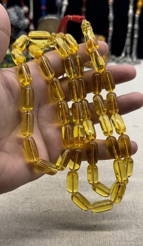 كهرمان بولندي شفاف صافي قص صنوبري ٩ مل ٥٢ جرام ٤٥ خرزه