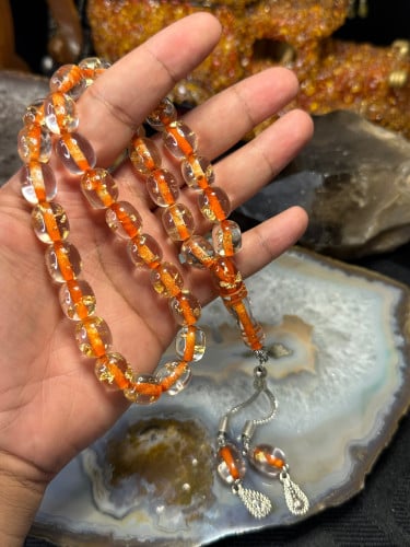 مسباح بكلايت شفاف خيط برتقالي