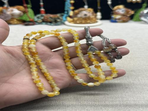 عقيق شرف الشمس مترش ٩٩ خرزه ٦ مل
