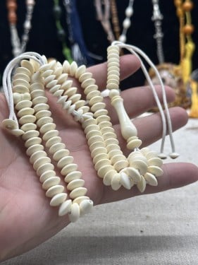 مسباح عظم قص نوادر اسطواني ٩٩ خرزه عداد