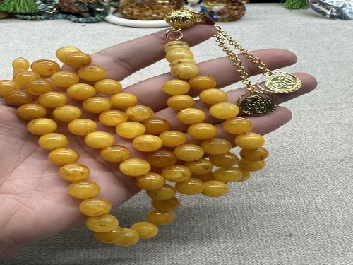 كهرمان بولندي قديم كركوشه مطليه ذهب عيار ٢١ منحوت ( الله) على المركوشه ٩٩ خرزه ١٠ مل