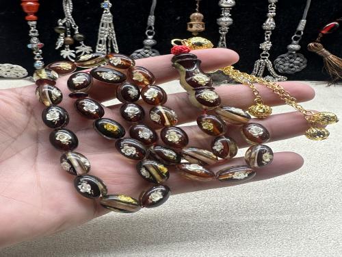 اندر النوادر كهرمان ابو ورده ٩ مل ٢٩ جرام ٣٣ خرزه