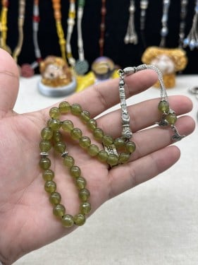 زبرجد طبيعي 33 خرزه 10 مل