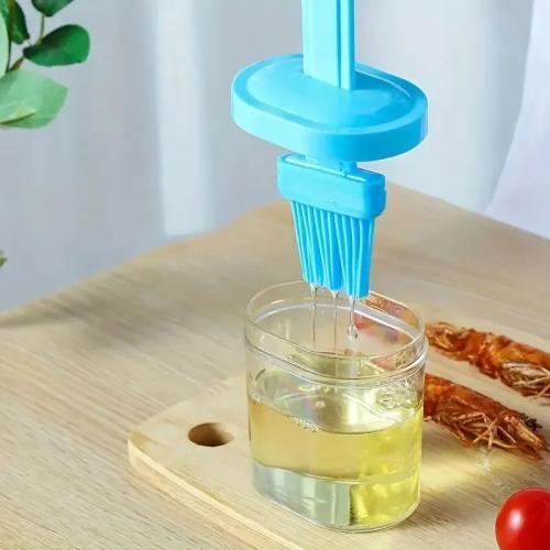 فرشاه لتوزيع الزيت
