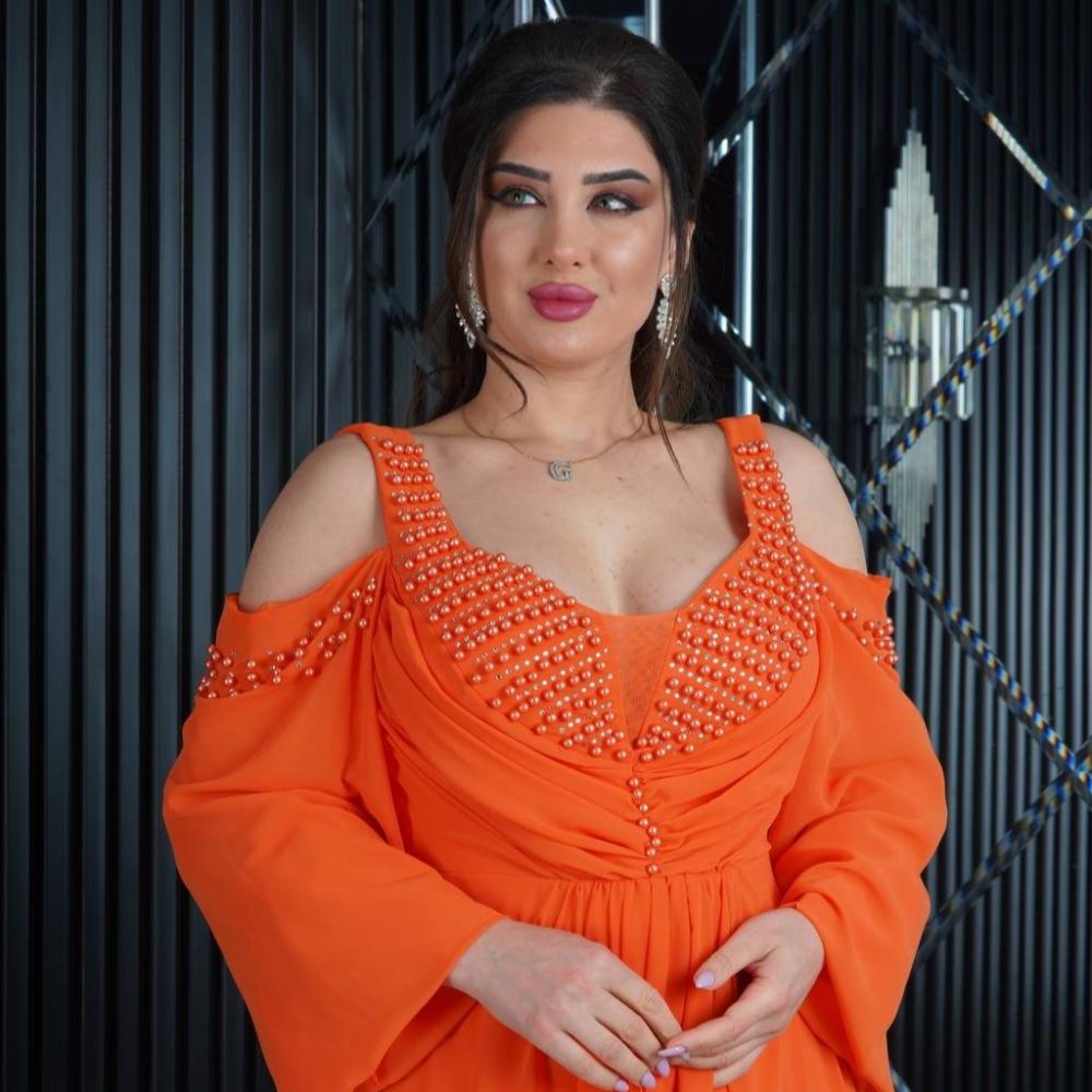 فستان "إليجانس وايت" برتقالي