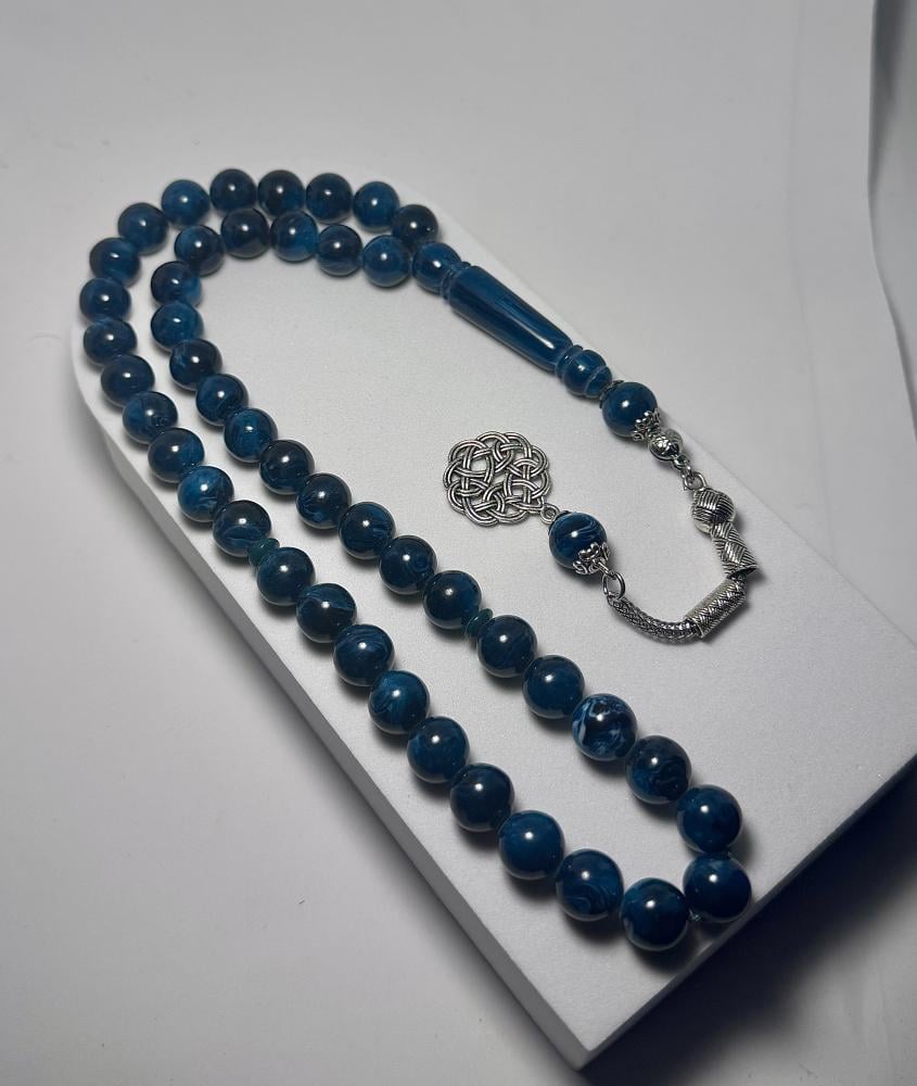 مسباح باللون الاخضر — مع طربزونة