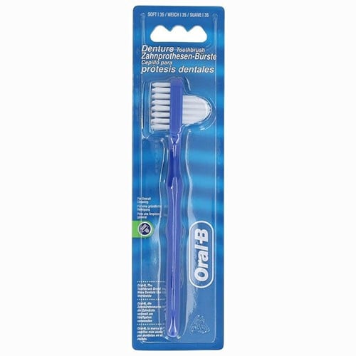 Oral-B dual-head toothbrush for cleaning dentures