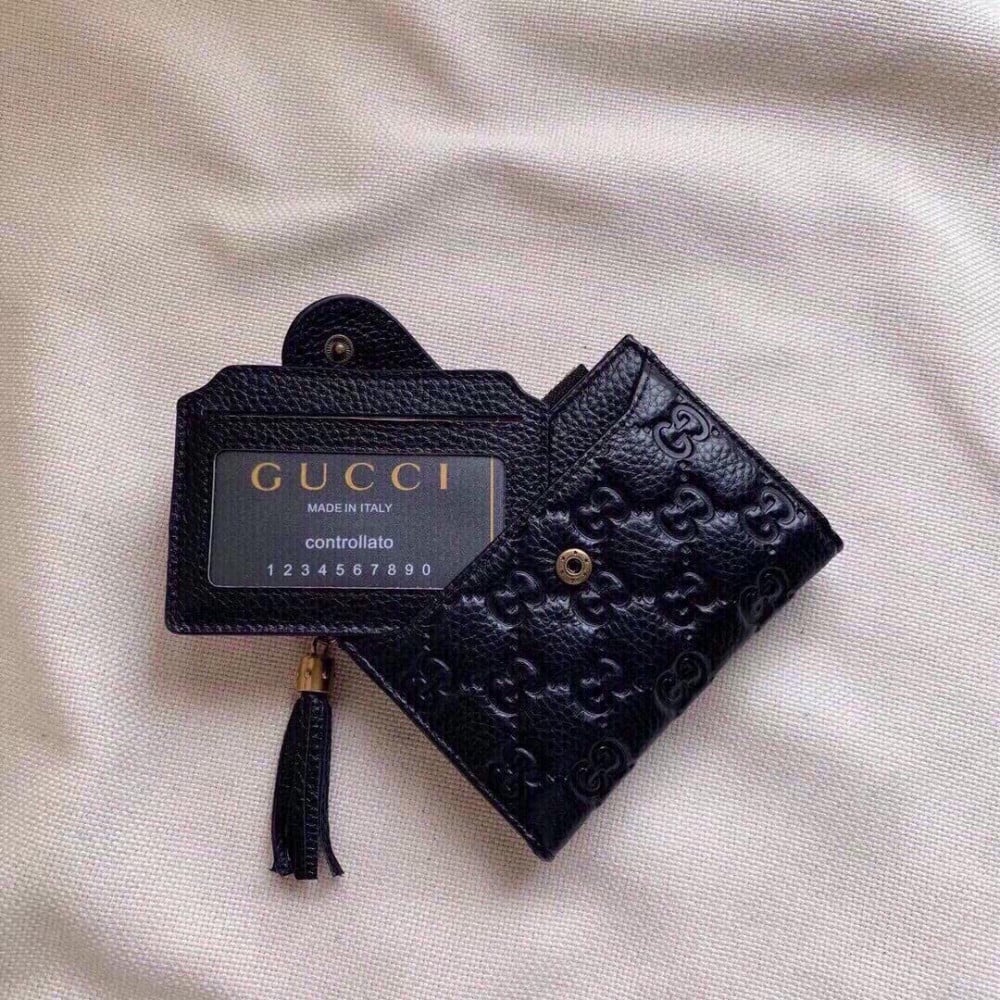 G U C C I