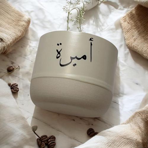 كوب مع عبارة
