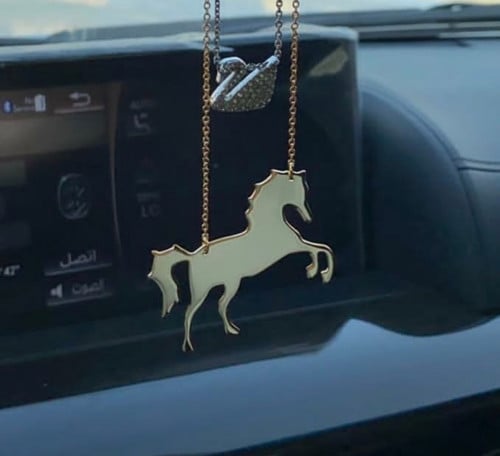 تعليقة سيارة خيل