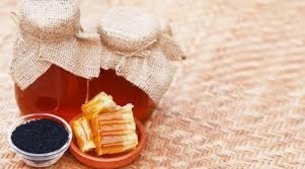 فوائد عسل حبة البركة: كنز من الصحة والطاقة