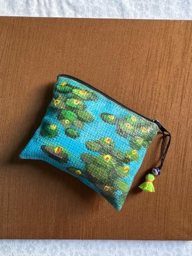 حقيبة صغيرة مصنوعة من قماش الكانفس بسحاب 13*11 cm