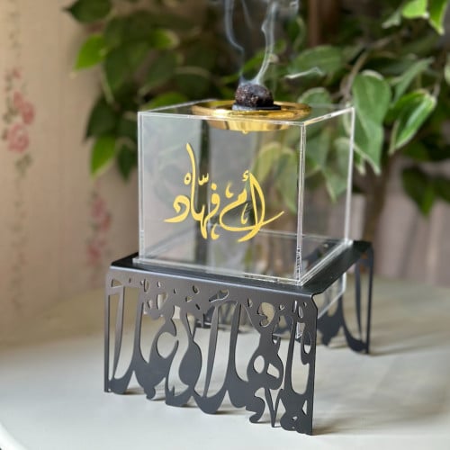 مبخرة زجاج بقاعدة حديدة