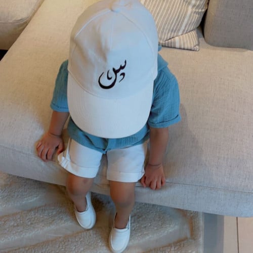 كاب مطبوع بالاسم