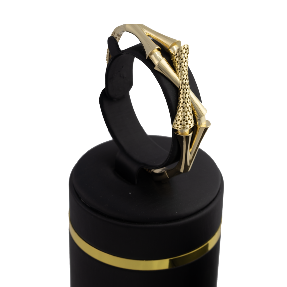 طقم البامبو المتقاطع اسوارة وخاتم عيار 18 وزن 14.7 جرام - شذور الذهب