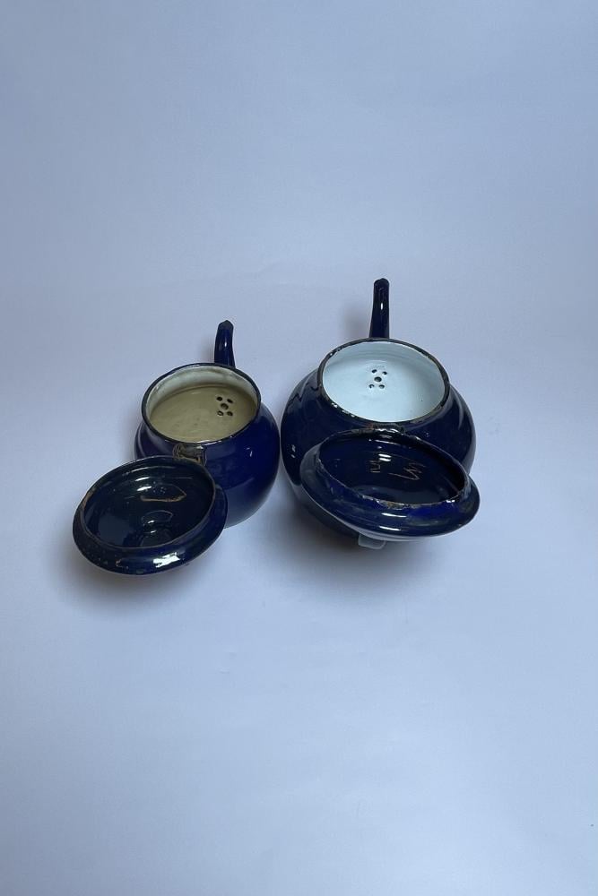 طقم اباريق غضار ازرق